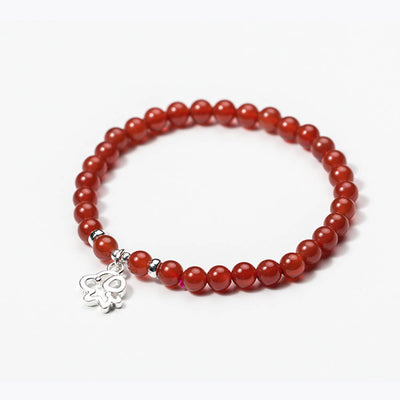 Bracelet en pierre agate rouge avec charm en argent
