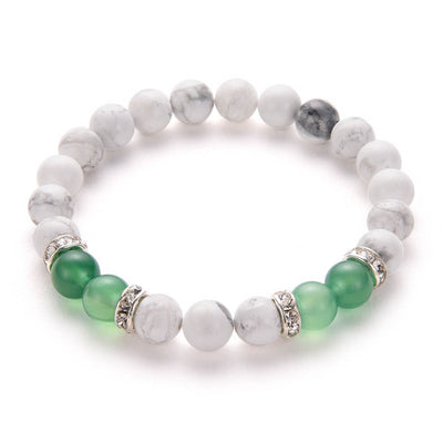 Bracelet en pierre naturelle de turquoise blanc avec details argentés et cristaux