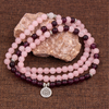 Bracelet mala 108 perles améthyste et quartz rose avec médaillon lotus
